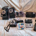 Vtg Lot Of 8 2 Folding Camera's. Kodak, Sony, Canon Some For Part's. Fixed Price $103.99.