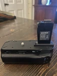Neewer Battery Grip For Canon Rebels And Eos Models. Fixed Price $14.00.